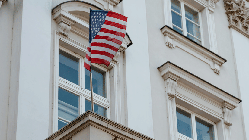 US Embassy building with the American flag.