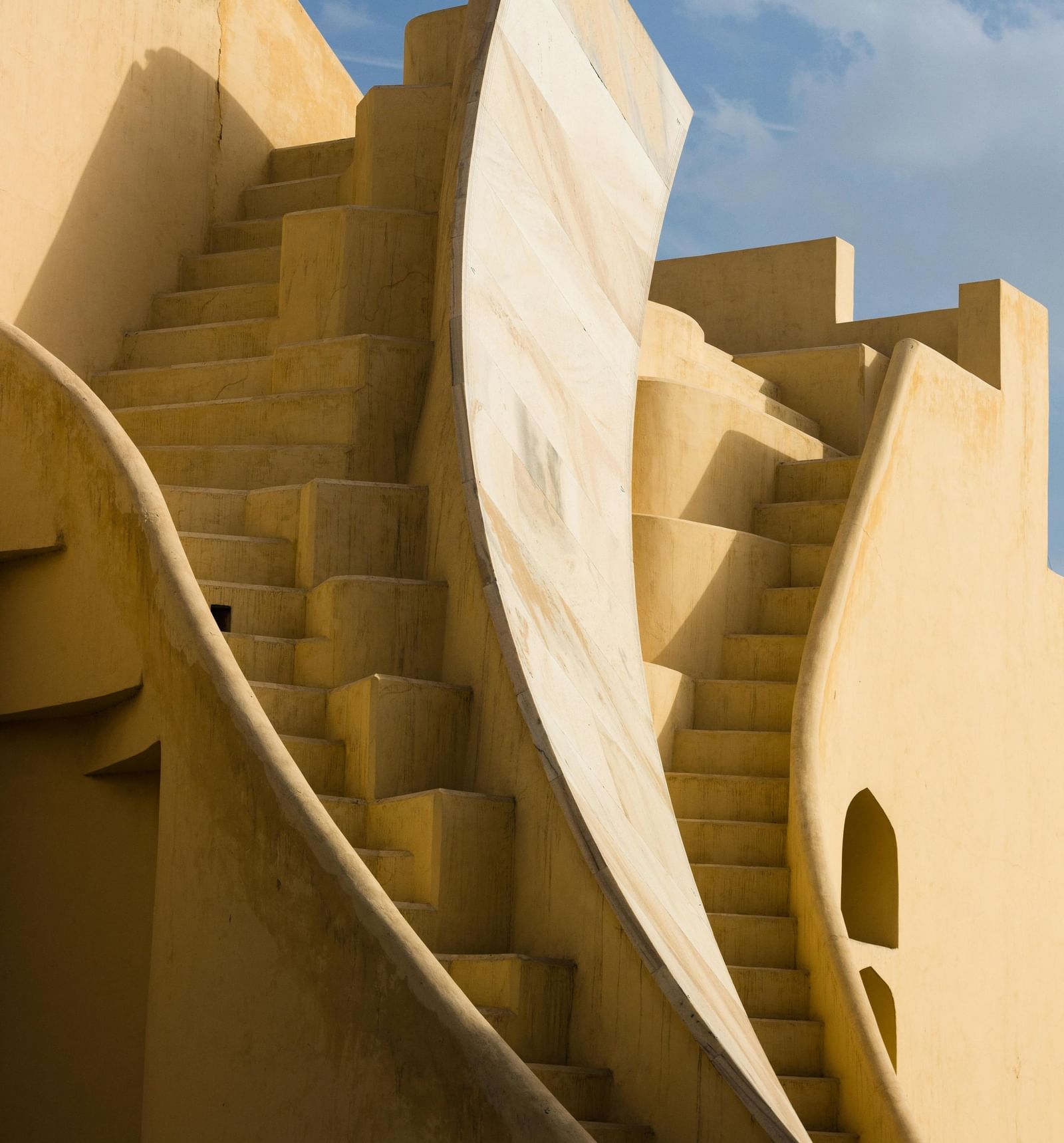 Close-up of a geometric building facade under the sky