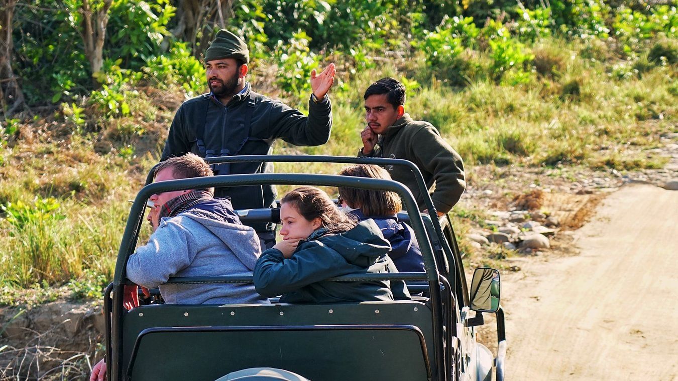 People on a jeep during Safari- The Golden tusk