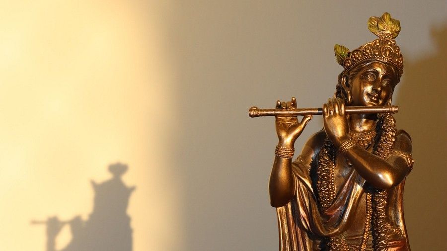 idol of Lord Krishna playing the flute