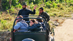 People on a jeep during Safari- The Golden tusk