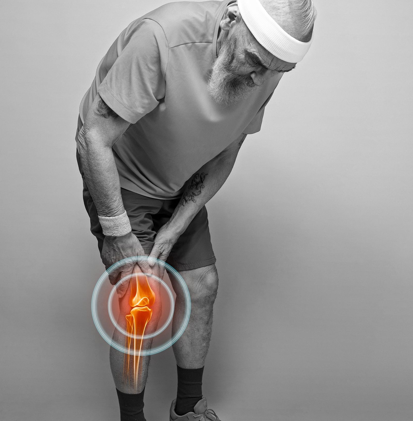 A person holding his knee showcasing Musculoskeletal Disorders - Shreyas Retreat