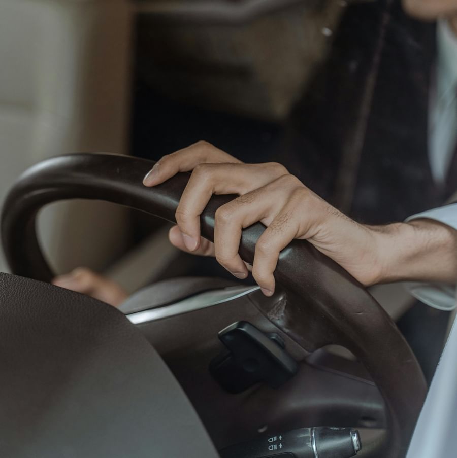 A person driving a car