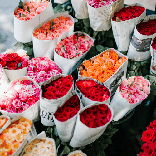 a bouquet of flowers kept for sale on the road side 
