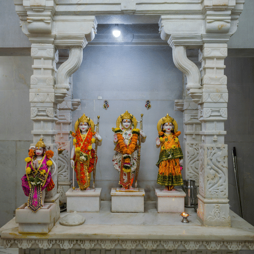 An overview of the idols of Ram, Sita, Lakshman, and Hanuman inside a temple. These idols can be found inside Sita Gufa, Panchvati, Nashik.