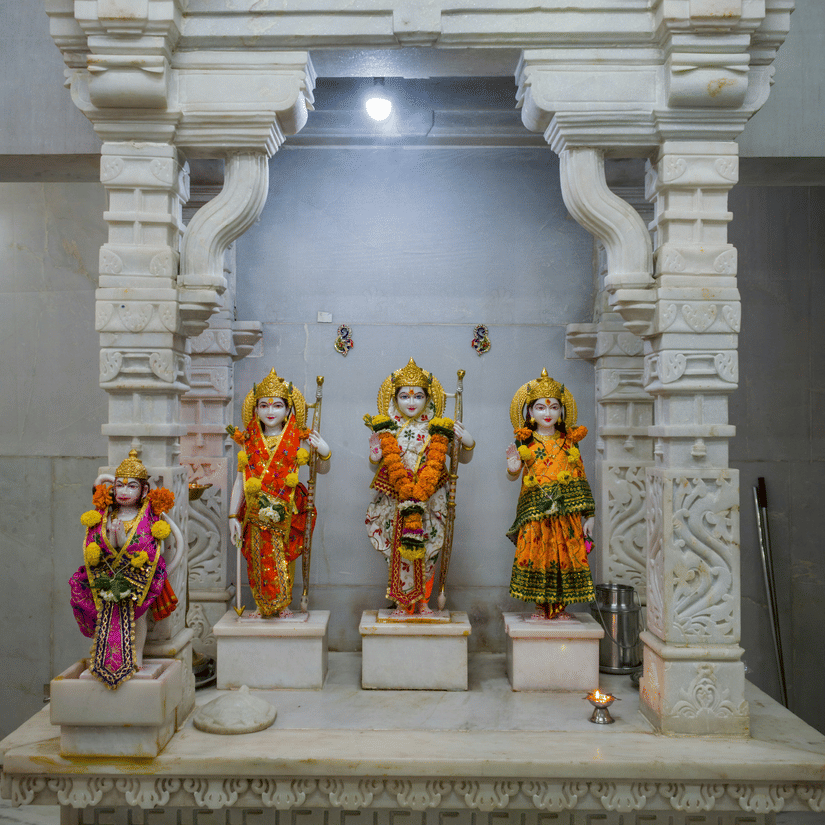 An overview of the idols of Ram, Sita, Lakshman, and Hanuman inside a temple. These idols can be found inside Sita Gufa, Panchvati, Nashik.