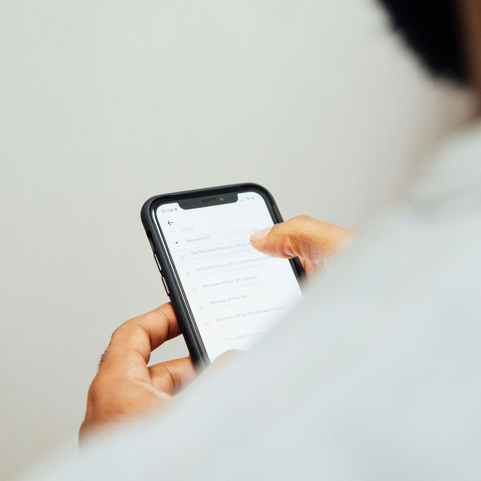 A person using his phone.