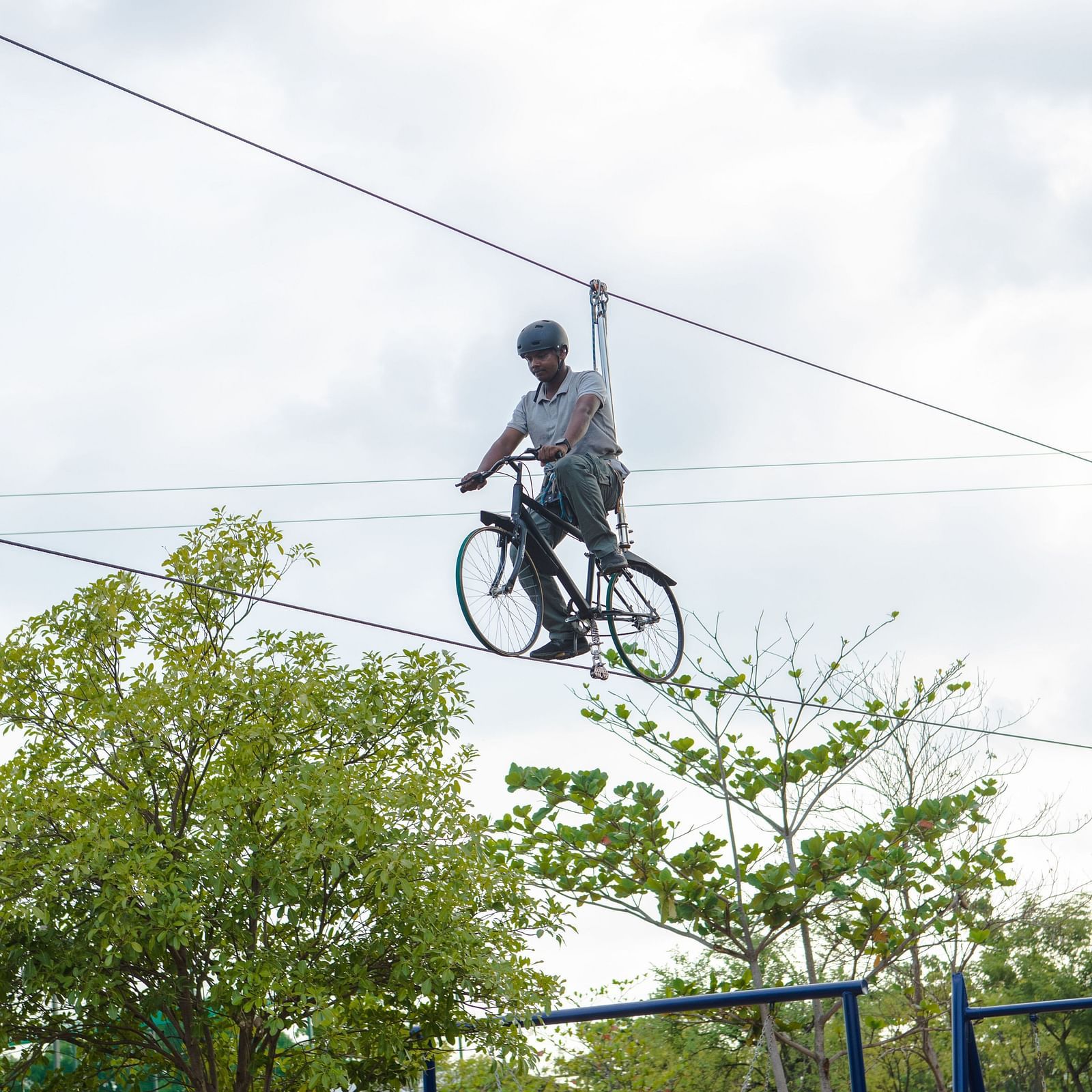 An image of a person doing zip cycling - Trance Veechika Resort, Vikarabad