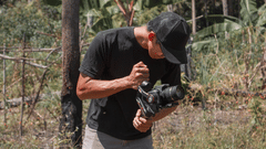a person shooting a video of something on the ground.