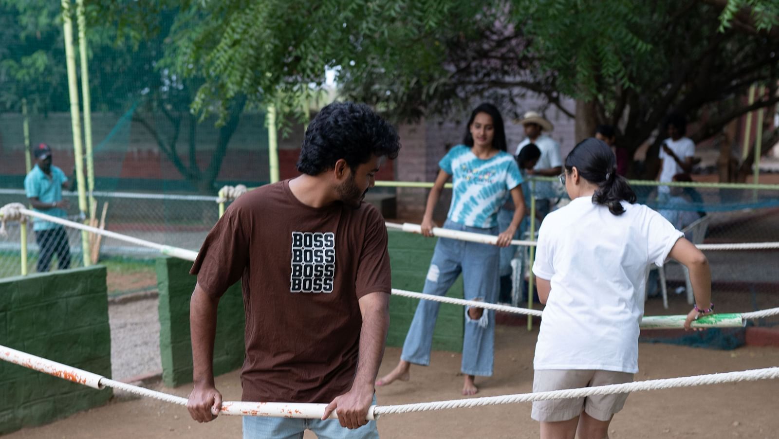 Image of guest playing volley ball in the Game zone at the hotel.