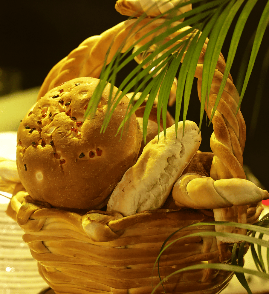 Artfully displayed bread and baked delights set up for a refined dining experience at The Sonnet.