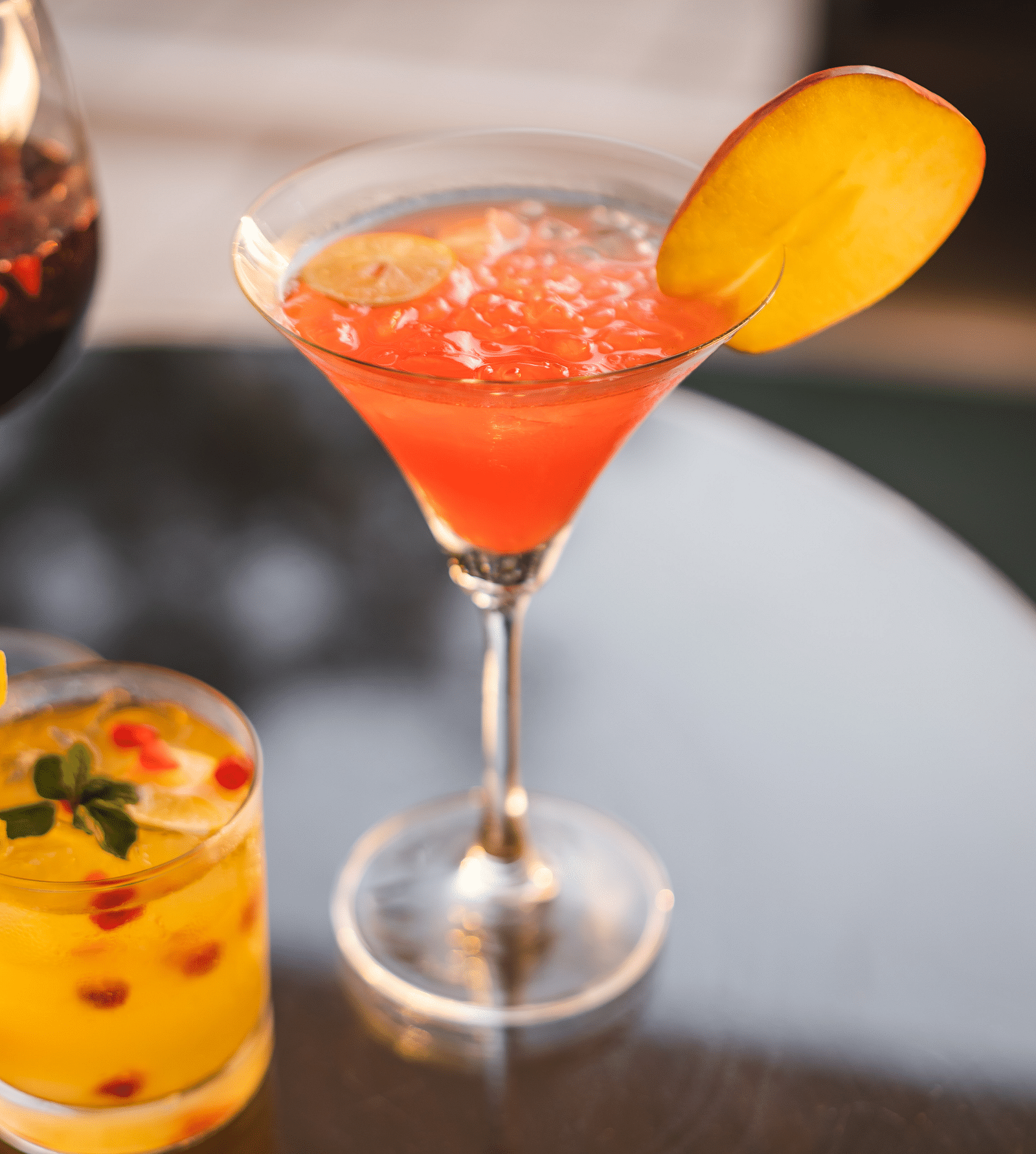 a glass of a cocktail served by Victorian Bar at The Claridges Nabha Residence