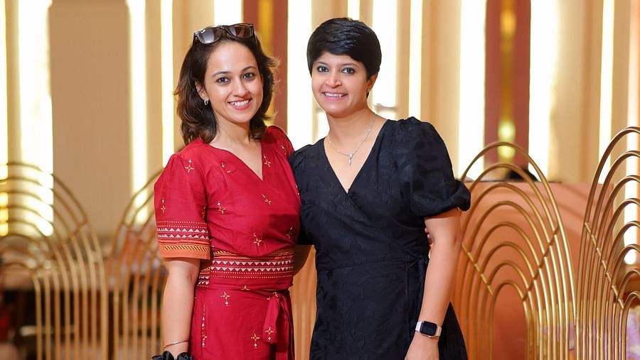 An image of two women posing at Themis Barbecue House, Ambala