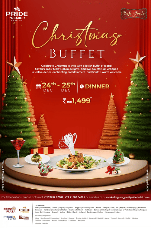A creative of Christmas buffet setup with roast turkey, desserts, and holiday décor at Cafe Pride, Pride Premier Nagpur.