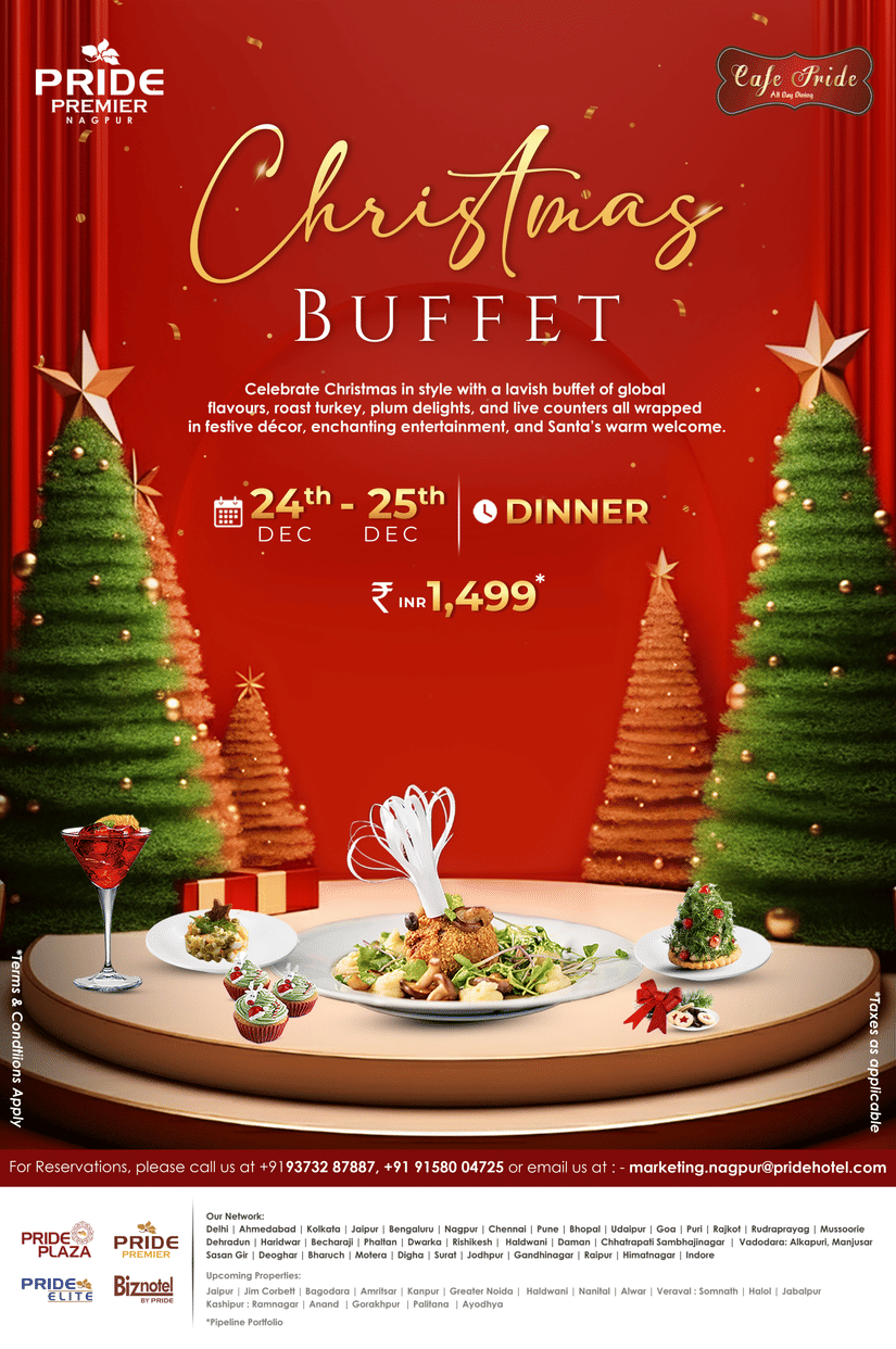 A creative of Christmas buffet setup with roast turkey, desserts, and holiday décor at Cafe Pride, Pride Premier Nagpur.