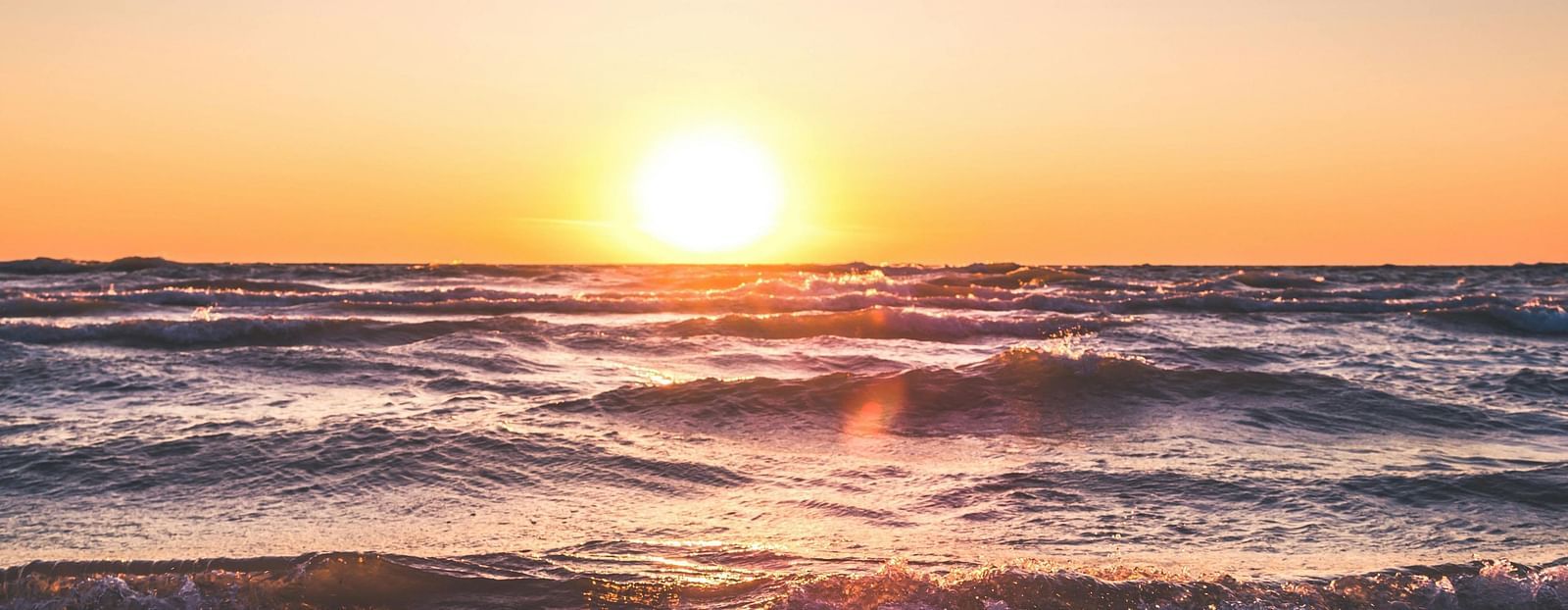 Scenic view of a sunset on a beach.