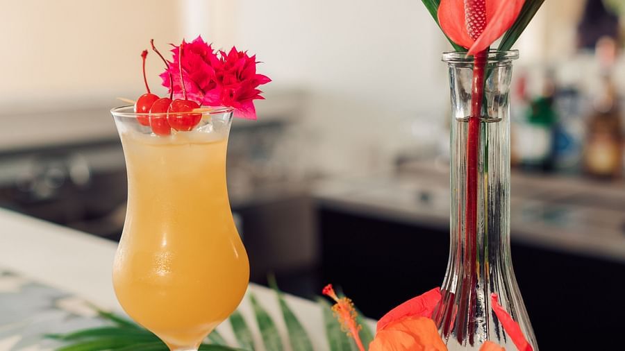 The Soco House - a table with a drink kept on it