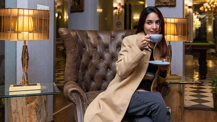  A person enjoying coffee in our club house  - The Manor Luxury Hotel, Shimla