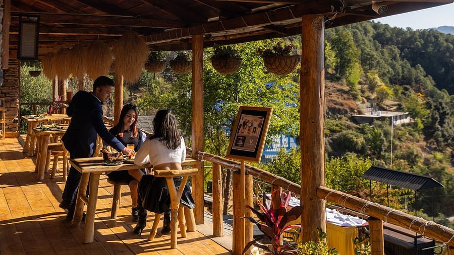 An image of an outdoor dining setup in a restaurant  - The Manor Luxury Hotel, Shimla