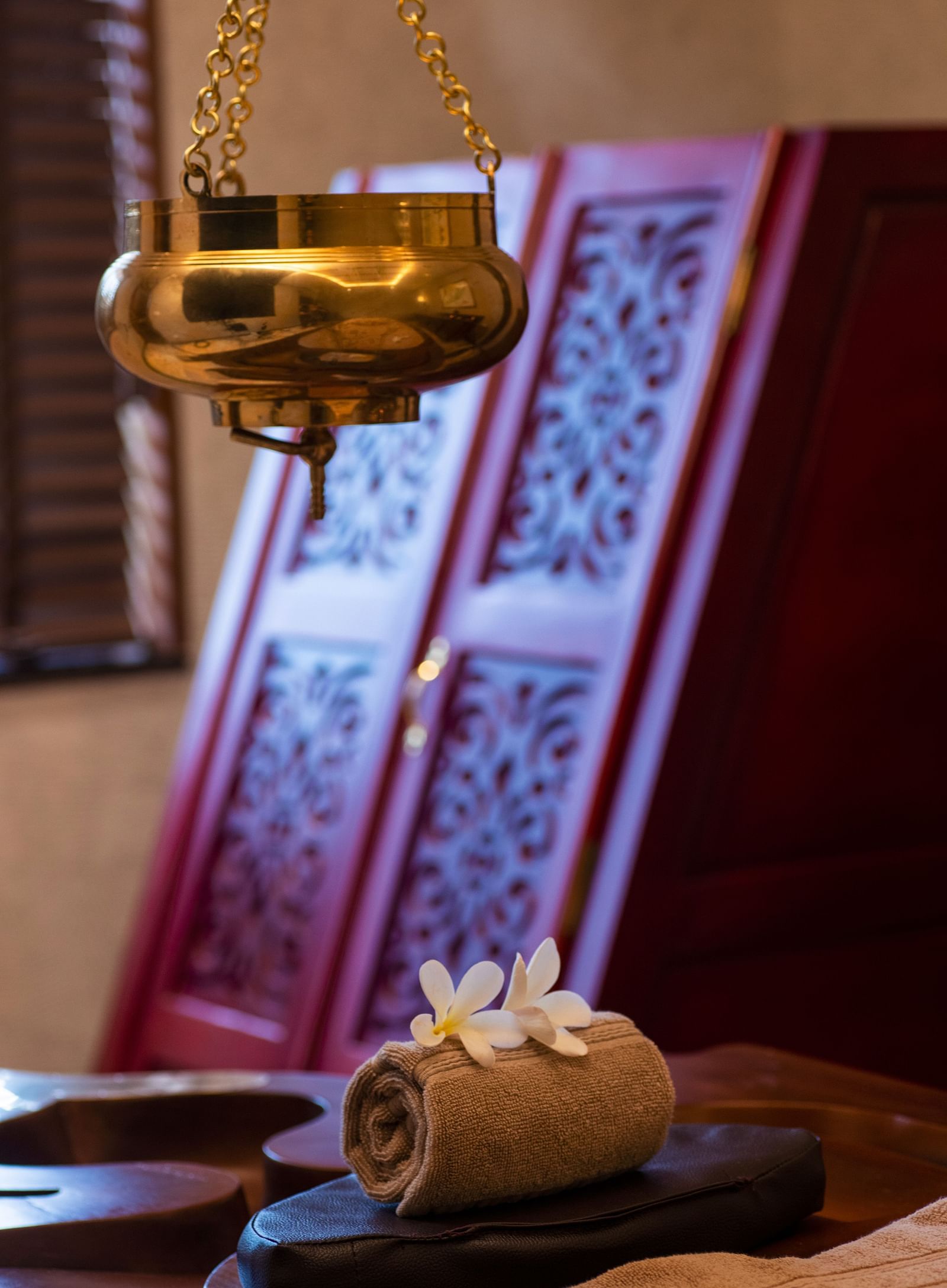 Gamyam Retreat, Kumta - Ayurveda tools kept on the table and a hanging oil dispenser 1