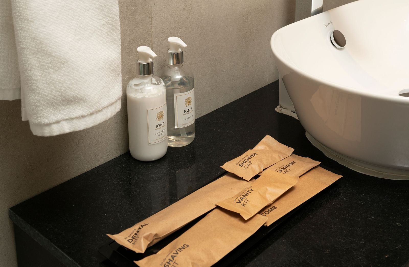 Minimalist sink area with eco-friendly toiletries at Nivasana Manali.