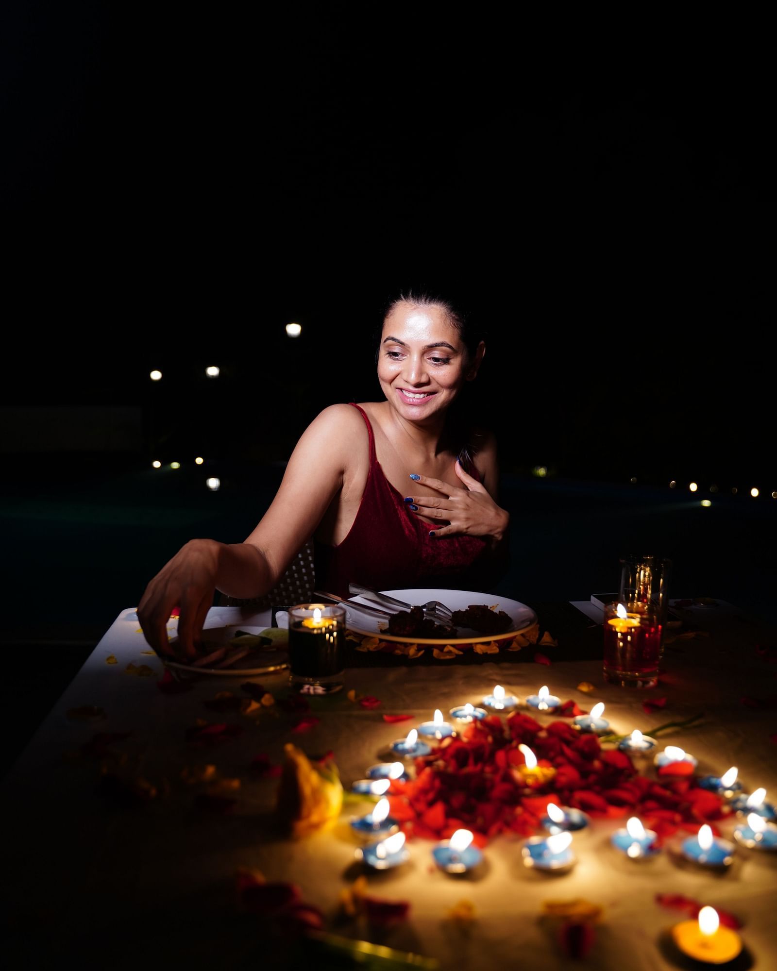 Ravishing Retreat Ramanagara - A guest enjoying a candle lit dinner at our resort