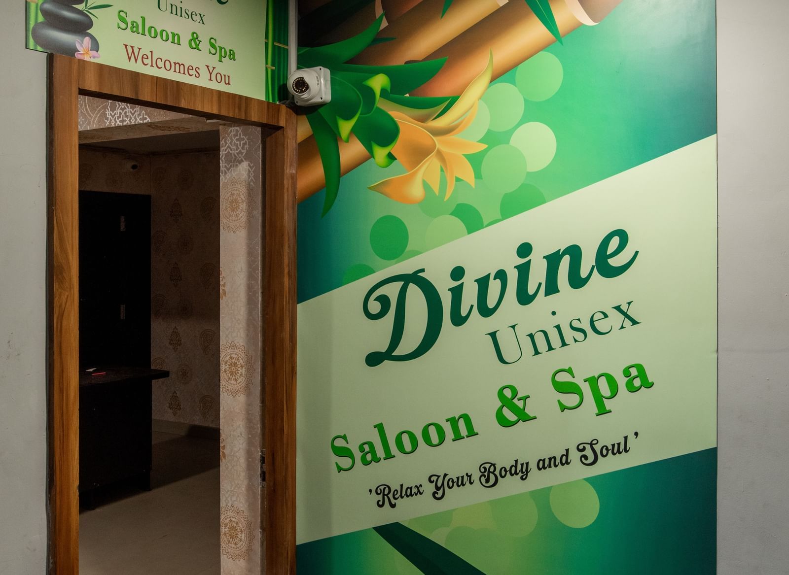Entrance of Divine Salon and Spa with signage at Hotel Royal Regency Chennai