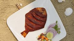 Pomret with a side of raw onion and vegetable salad