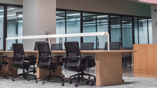Desk and chairs in a well-lit office room