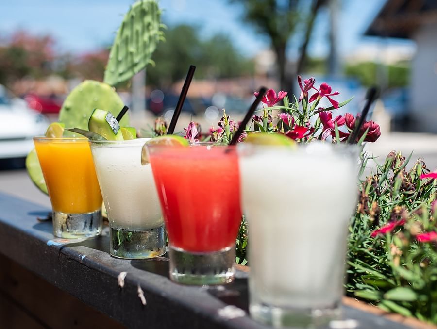 colourful drinks at a bar