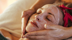 A woman getting massage done at a spa.