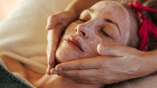 A woman getting massage done at a spa.