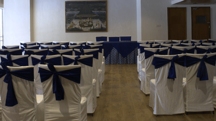 Surya Mahal conference hall at Clarks Amer, Jaipur featuring chairs and table in classroom set up.