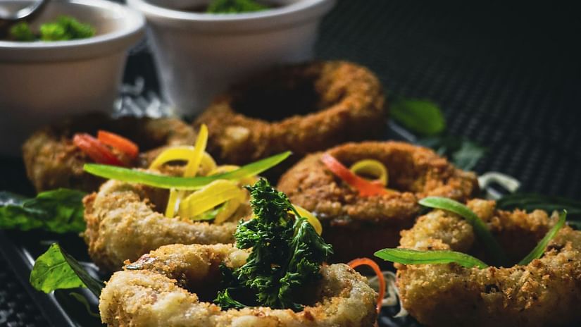 an image of a food platter on a tray with dips