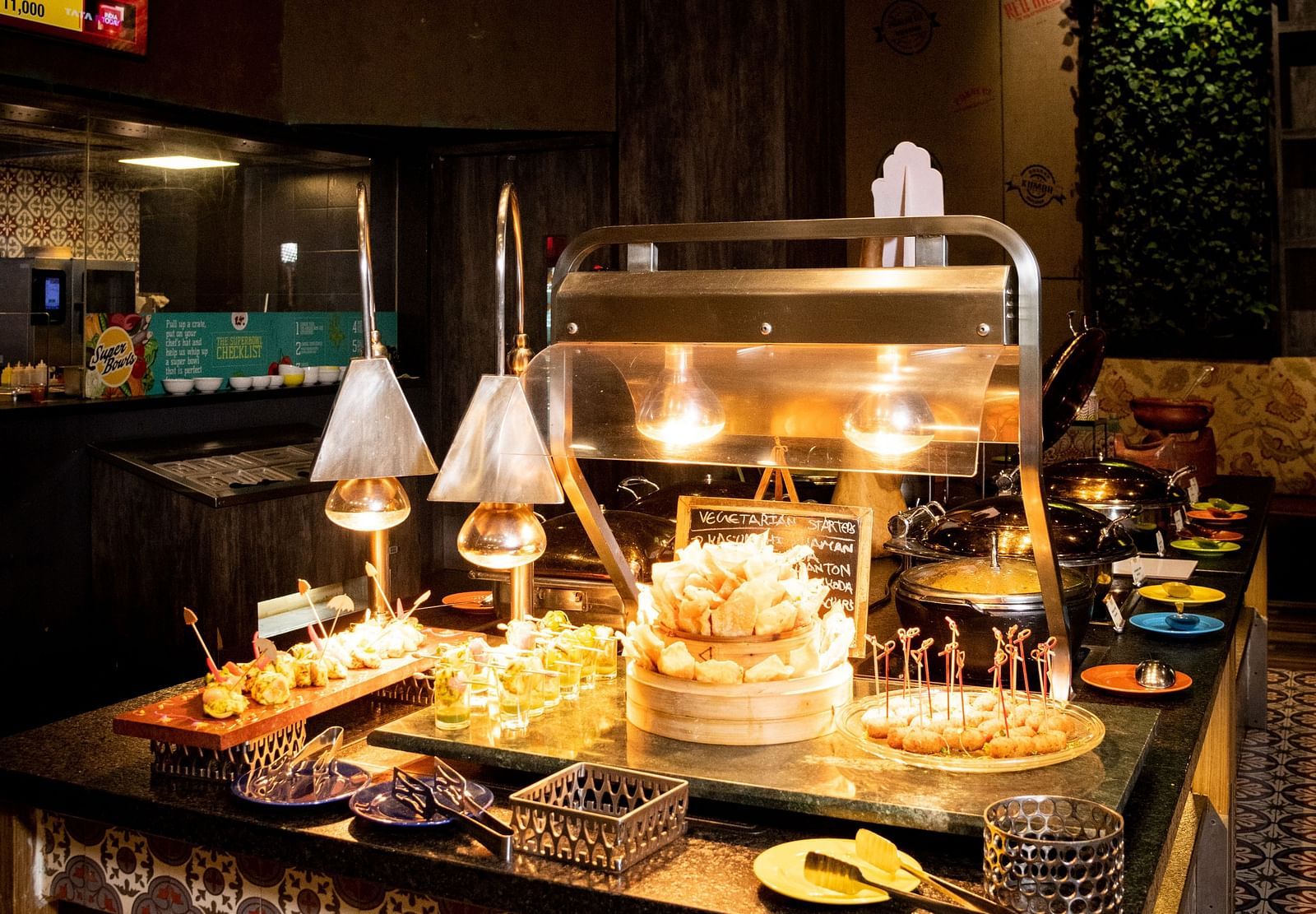 Front view of table with food items at Grand Chennai By GRT Hotels.