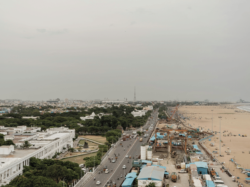 Aerial view of Marina Beach and the Chennai coastline .