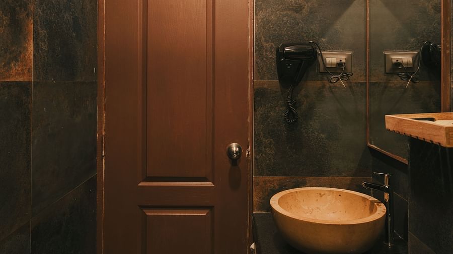 Luxurious bathroom at the Two BHK apartment in Richmonde Ananta Elite, Goa, featuring elegant decor and modern amenities.