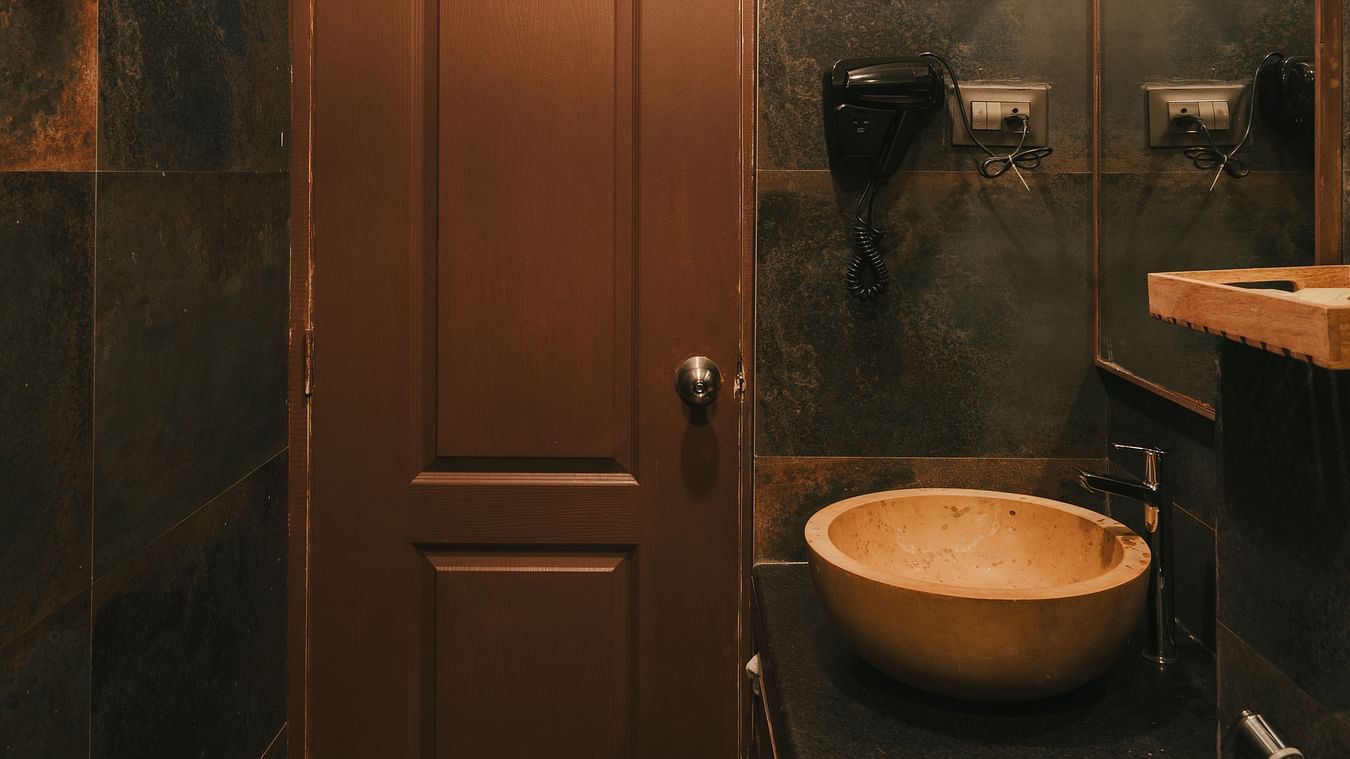 Luxurious bathroom at the Two BHK apartment in Richmonde Ananta Elite, Goa, featuring elegant decor and modern amenities.