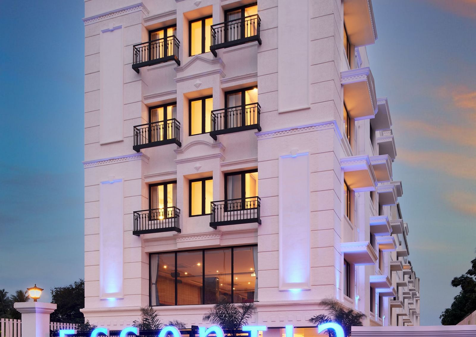 An overview of the Facade of Essentia Premier Hotel, Chennai during twilight.