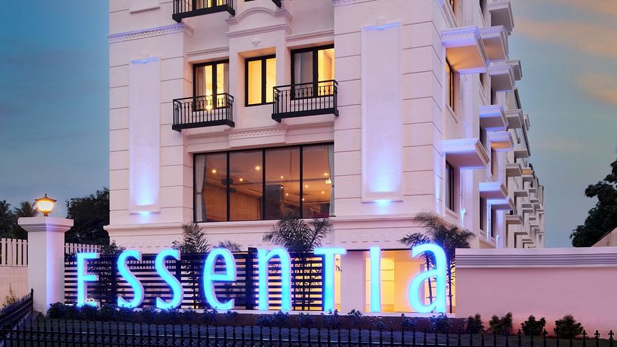An overview of the Facade of Essentia Premier Hotel, Chennai during twilight.