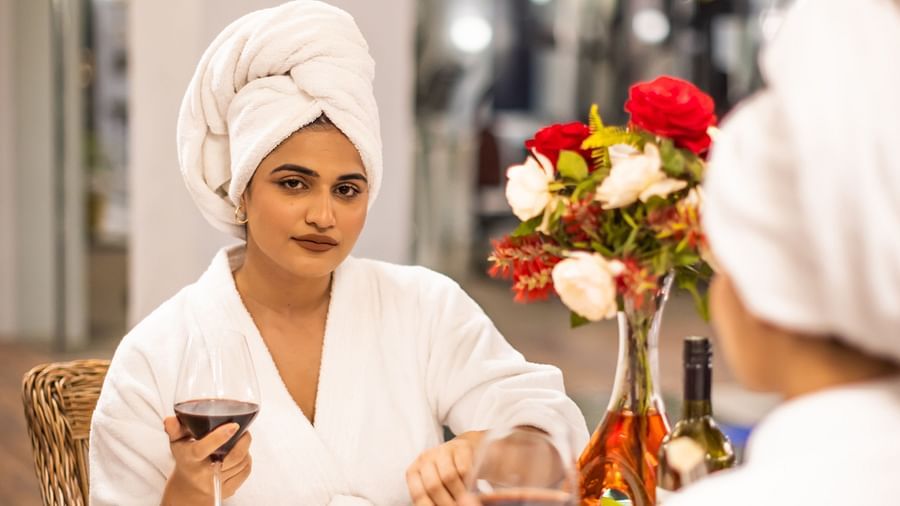 An image of two women having dinner in bathrobes  - The Manor Luxury Hotel, Shimla