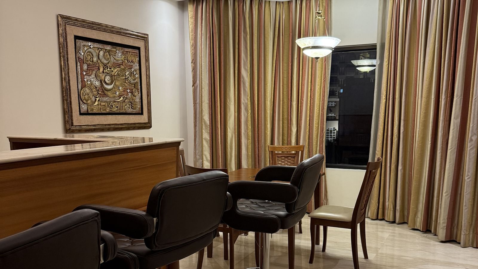A wooden table with high chairs placed beside it | Cenneys Gateway