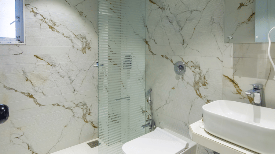 Spacious ensuite bathroom in a serviced apartment near Mumbai Airport
