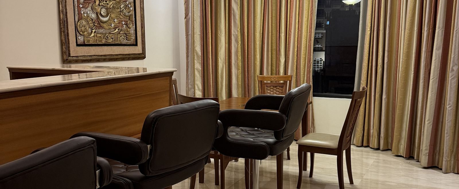 A wooden table with high chairs placed beside it | Cenneys Gateway
