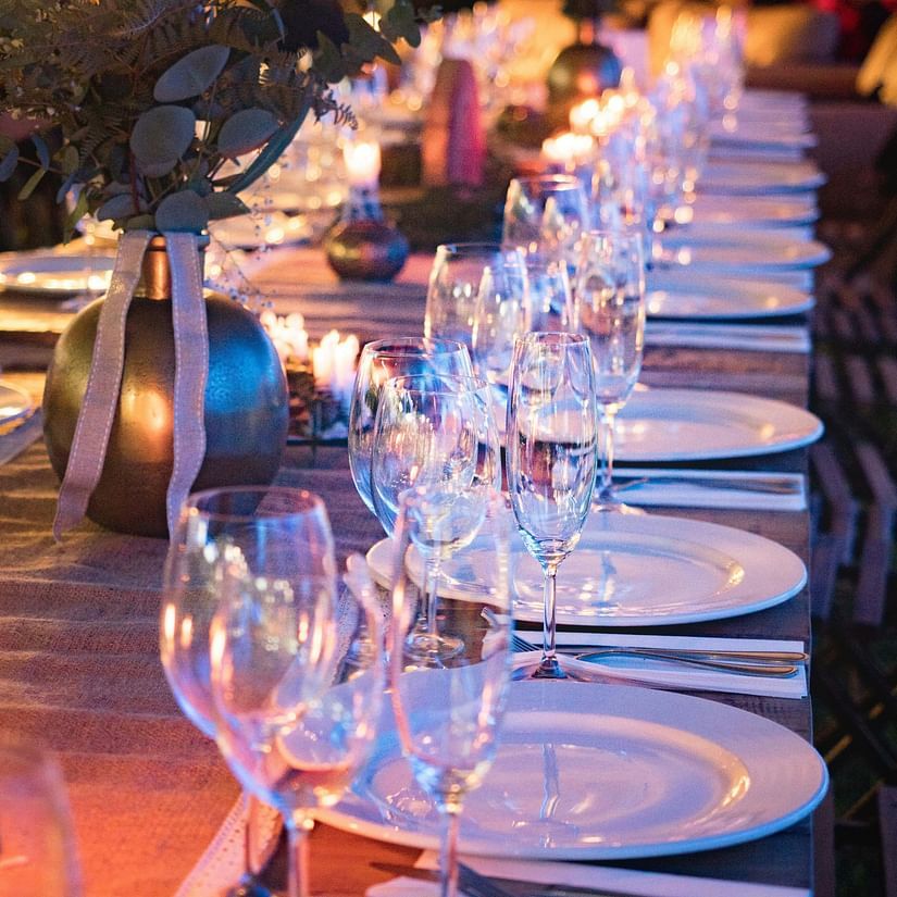 Plates and Wine Glass on Table 