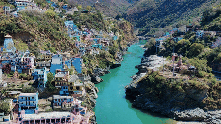 A view of the Devprayag Sangam with Bhagirathi and Alaknanda Rivers merging to form the River Ganga. This is one of the places to visit on your list of things to do in Devprayag.