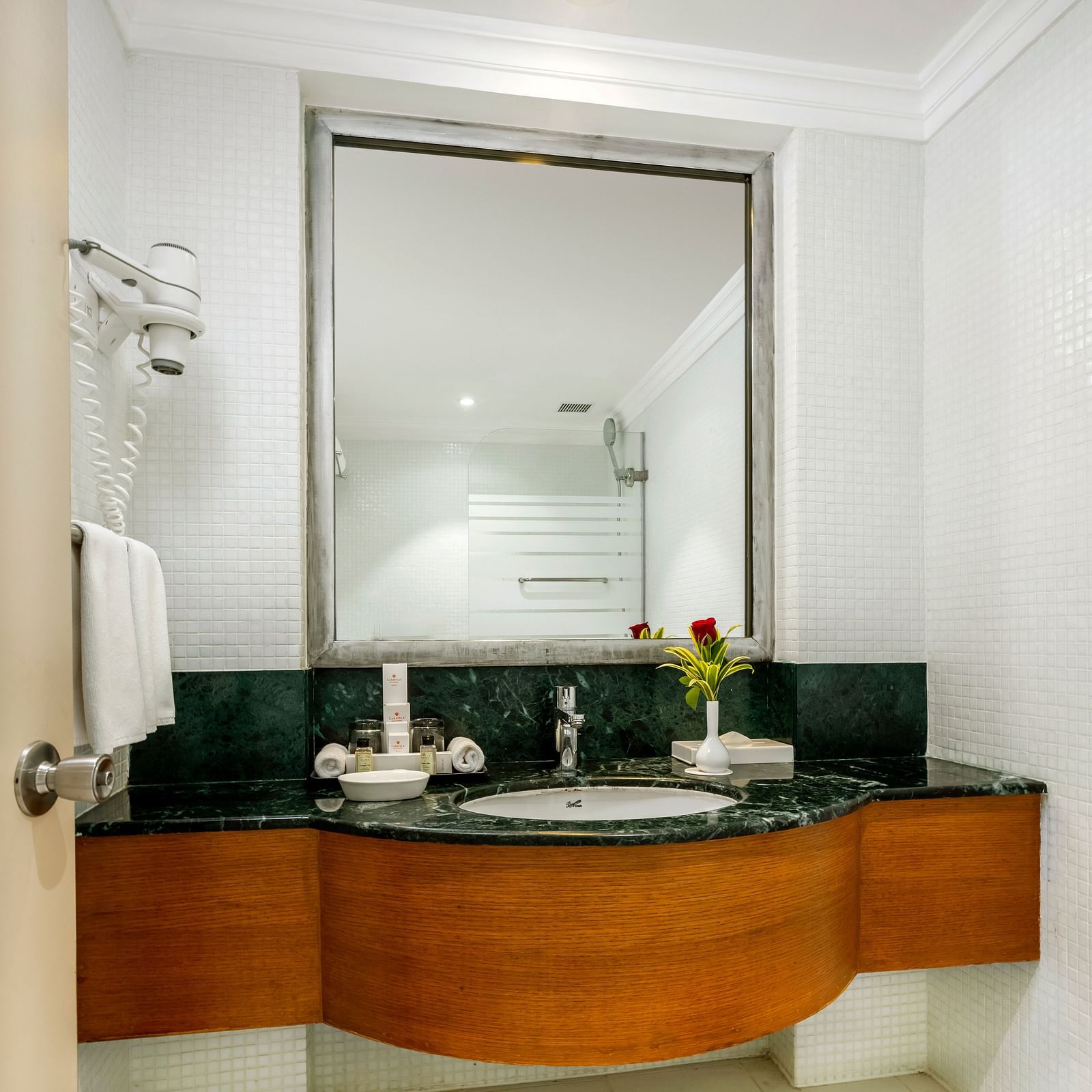 an overview of the bathroom with a sink area in view inside Ocean front view - Caravela Beach Resort Goa