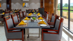 Seating arrangement inside Saffron restaurant - VITS Satyajeet Karad