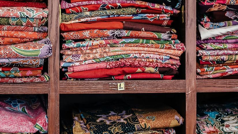 Saree fabric arranges in shelves