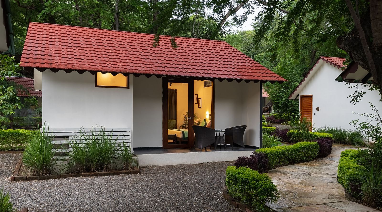facade image of the luxury pond view villa featuring a private courtyard